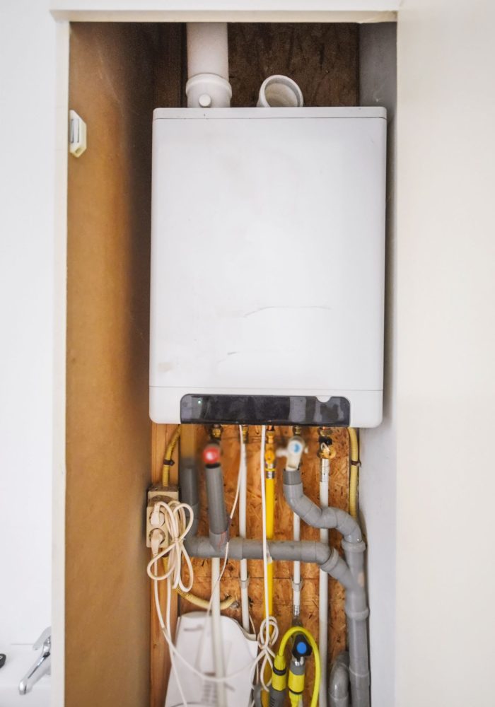 An electric dashboard with cables in a small room